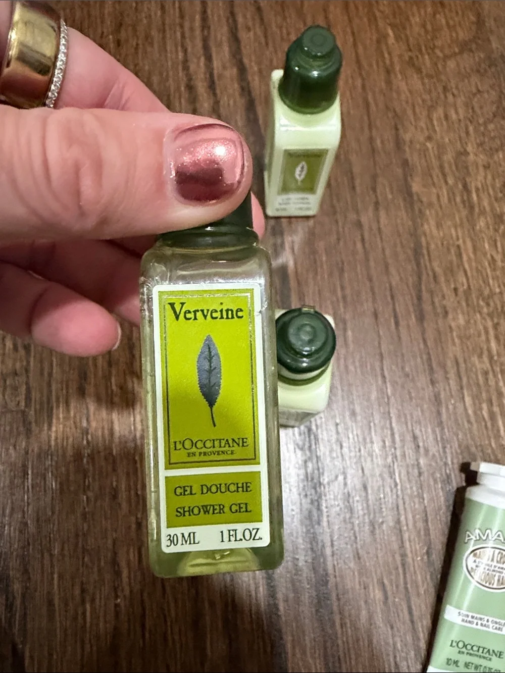 L’Occitane Travel size body lotion, shower gem, and hand cream